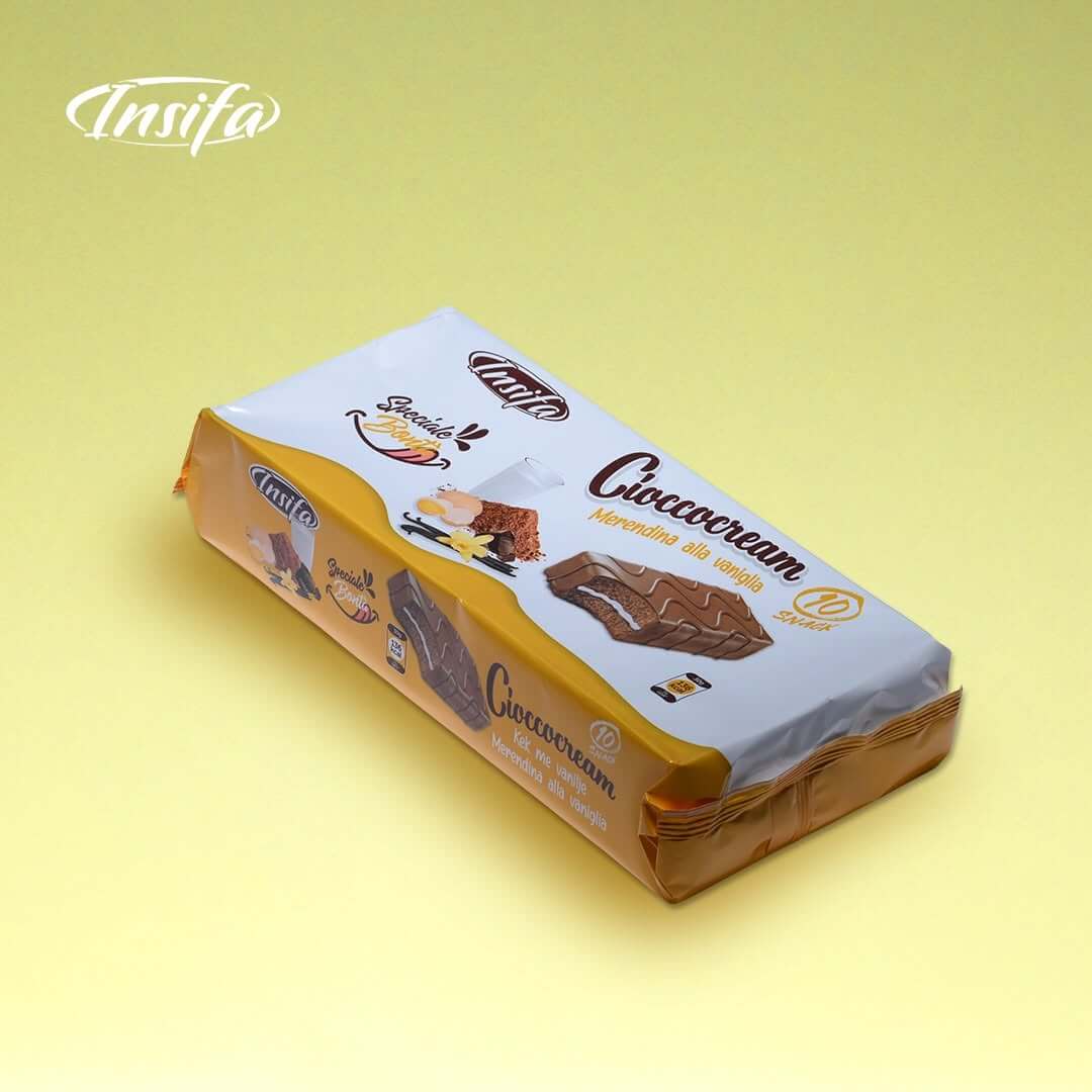 Chococream vanilla snack bars with soft sponge layers and creamy vanilla filling, individually wrapped in white and gold-themed packaging.