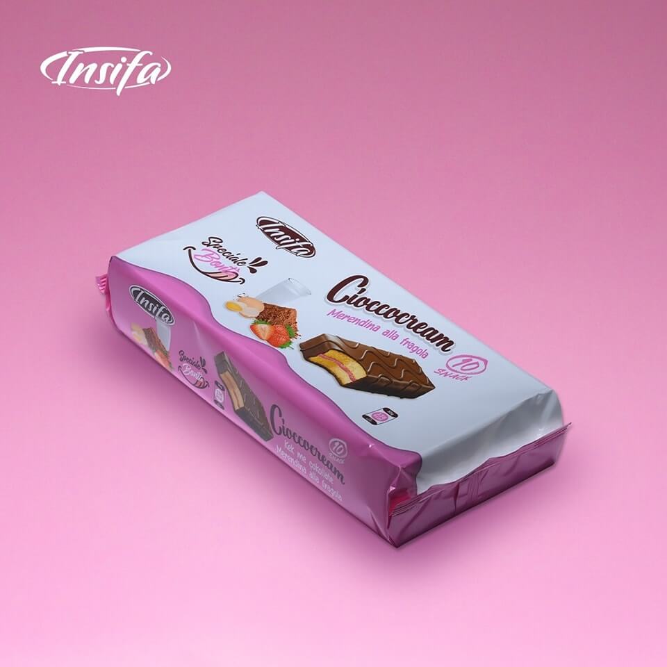 Chococream strawberry snack bars with soft sponge layers and creamy strawberry filling, individually wrapped in vibrant strawberry-themed packaging.